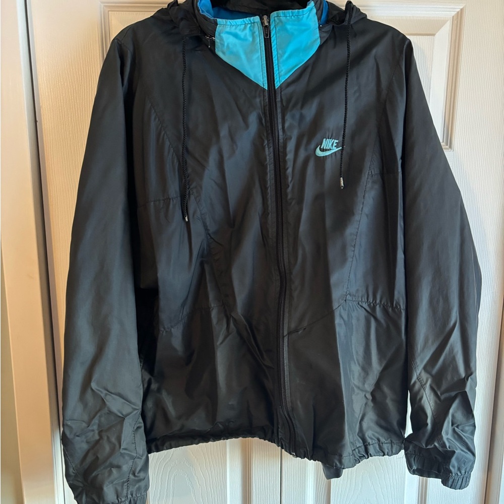 NIKE Black Raincoat/Windbreaker with hood